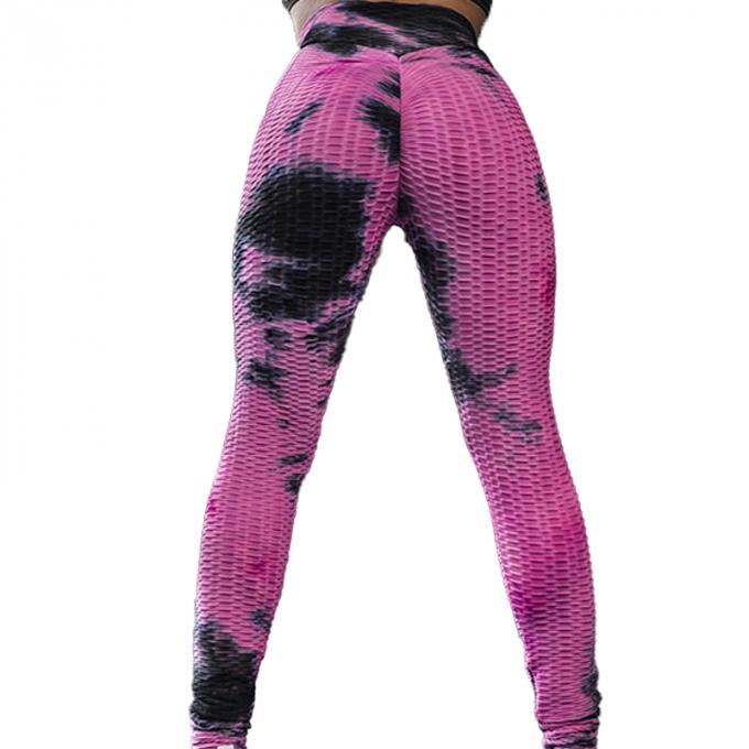 La vente en gros teignent en nouant le contrôle de ventre de pantalon de yoga les guêtres qu'extensibles de séance d'entraînement ont donné au yoga une consistance rugueuse Legging pour des femmes
