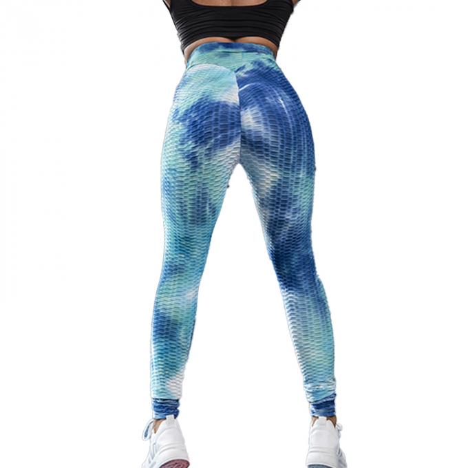 La vente en gros teignent en nouant le contrôle de ventre de pantalon de yoga les guêtres qu'extensibles de séance d'entraînement ont donné au yoga une consistance rugueuse Legging pour des femmes