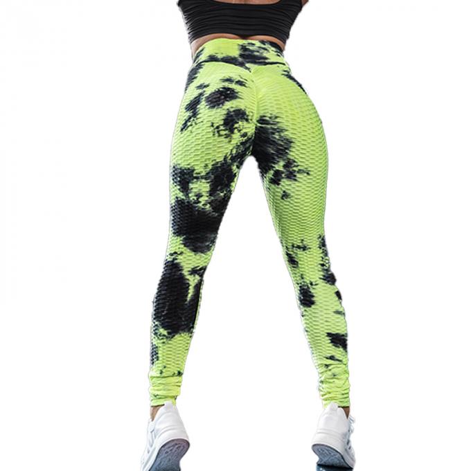 La vente en gros teignent en nouant le contrôle de ventre de pantalon de yoga les guêtres qu'extensibles de séance d'entraînement ont donné au yoga une consistance rugueuse Legging pour des femmes
