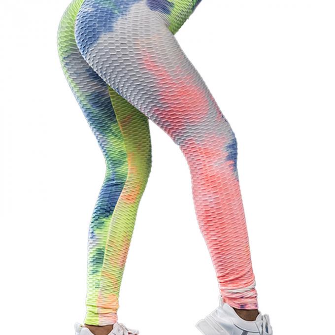La vente en gros teignent en nouant le contrôle de ventre de pantalon de yoga les guêtres qu'extensibles de séance d'entraînement ont donné au yoga une consistance rugueuse Legging pour des femmes