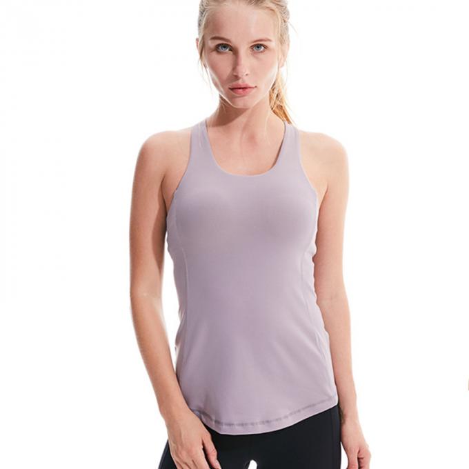 Soutien-gorge Strappy de sports pour le yoga entrecroisé sexy de femmes courant le dessus sans manche de culture de réservoir de séance d'entraînement sportive de gymnase