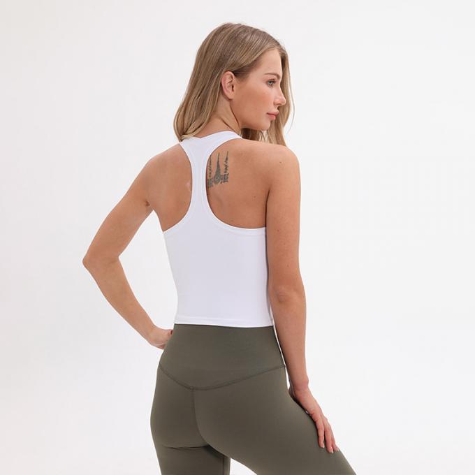 Dessus de réservoir blanc capitonné sans fil de culture de réservoir de soutien moyen de soutien-gorge de sports de l'aplet des femmes en gros de femmes faites sur commande de dessus