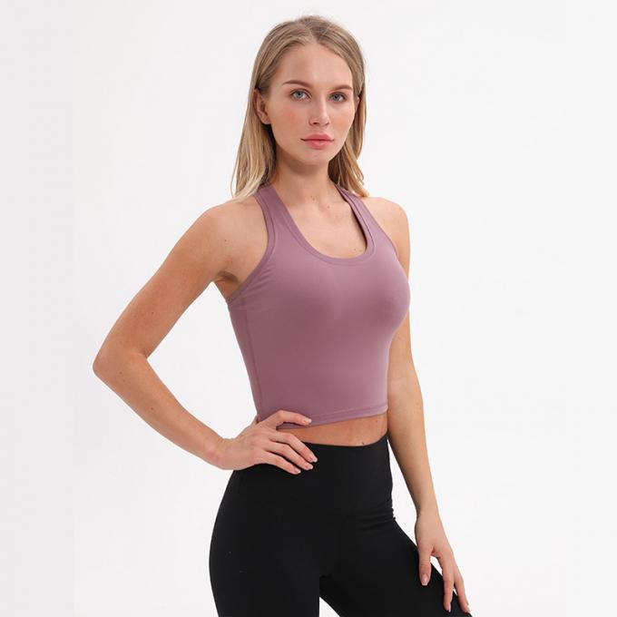 Dessus de réservoir blanc capitonné sans fil de culture de réservoir de soutien moyen de soutien-gorge de sports de l'aplet des femmes en gros de femmes faites sur commande de dessus