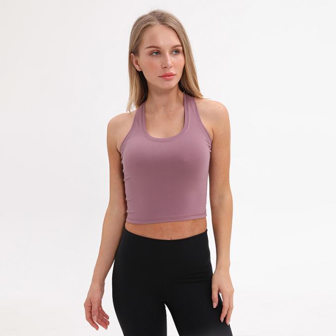 Dessus de réservoir blanc capitonné sans fil de culture de réservoir de soutien moyen de soutien-gorge de sports de l'aplet des femmes en gros de femmes faites sur commande de dessus