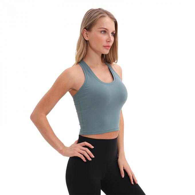 Dessus de réservoir blanc capitonné sans fil de culture de réservoir de soutien moyen de soutien-gorge de sports de l'aplet des femmes en gros de femmes faites sur commande de dessus