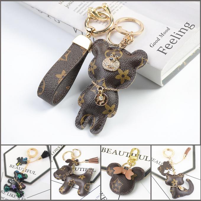 Le sac pendant en cuir en gros de chaîne principale de chien d'ours ornemente des accessoires Diamond Bear Keychain Keychains pour des femmes