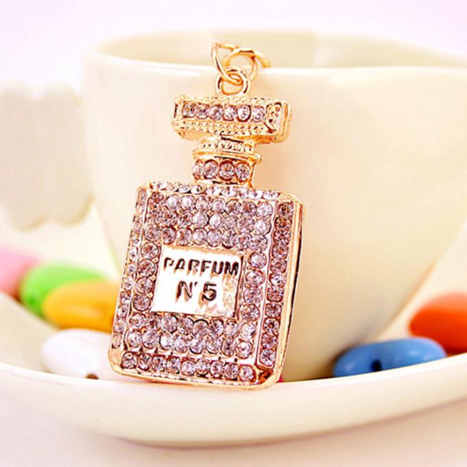 Les dames Diamant-cloutées créatives parfument le métal femelle Crystal Keychain de fausse pierre d'accessoires de sac de chaîne principale de bouteille
