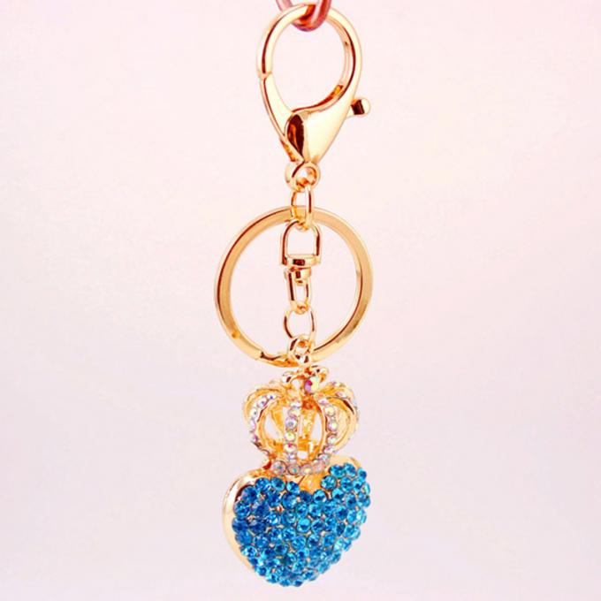 Les dames Diamant-cloutées créatives parfument le métal femelle Crystal Keychain de fausse pierre d'accessoires de sac de chaîne principale de bouteille