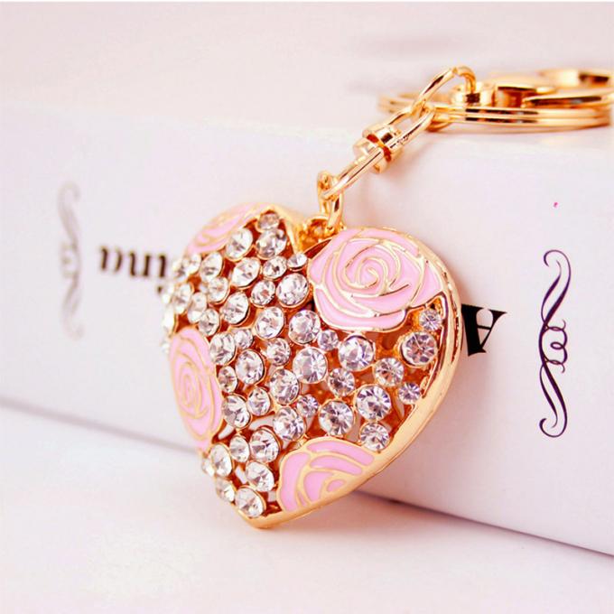 Les dames Diamant-cloutées créatives parfument le métal femelle Crystal Keychain de fausse pierre d'accessoires de sac de chaîne principale de bouteille
