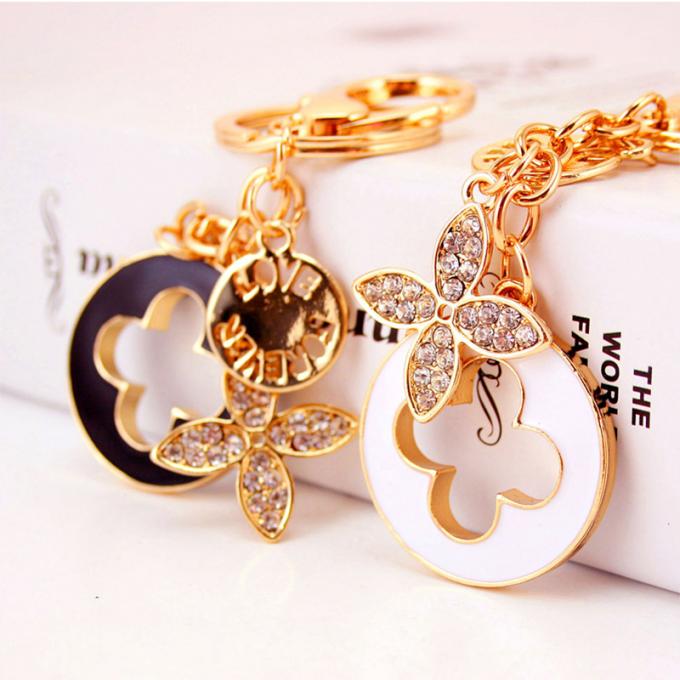 Les dames Diamant-cloutées créatives parfument le métal femelle Crystal Keychain de fausse pierre d'accessoires de sac de chaîne principale de bouteille