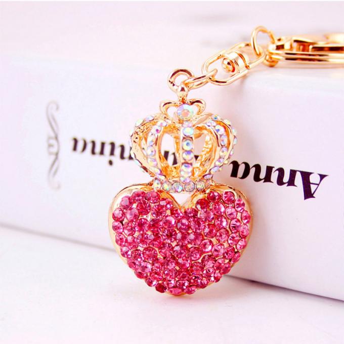 Les dames Diamant-cloutées créatives parfument le métal femelle Crystal Keychain de fausse pierre d'accessoires de sac de chaîne principale de bouteille
