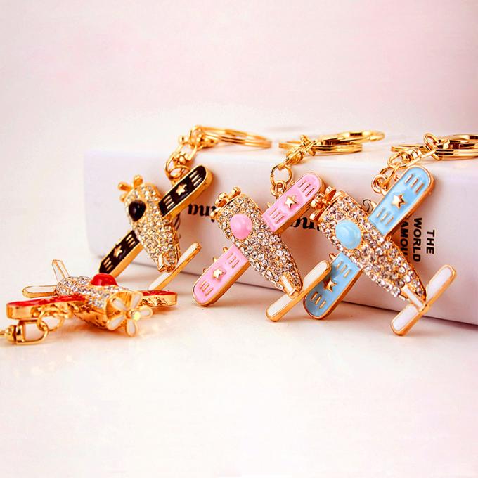 Keychains pour le logo de Crystal Luxury Designers Custom Keychain en métal de fausse pierre de Metal Pendant Motorcycle de modèle de femme