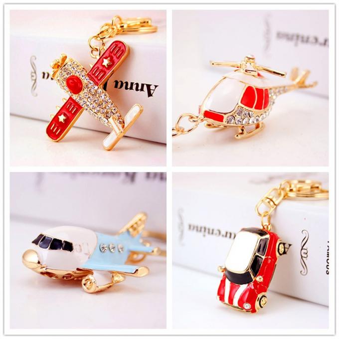 Keychains pour le logo de Crystal Luxury Designers Custom Keychain en métal de fausse pierre de Metal Pendant Motorcycle de modèle de femme