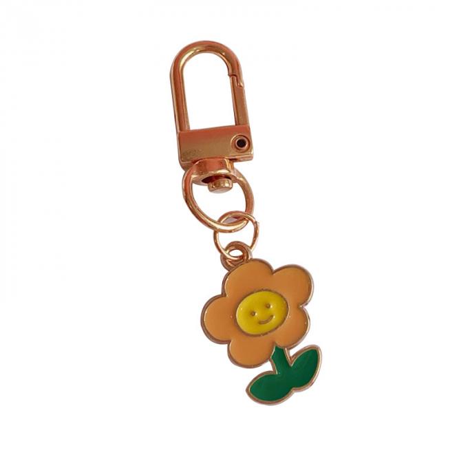 Le sac pendant de lapin de chaîne principale petit en métal en gros de fleur ornemente la bande dessinée mignonne Keychains d'accessoires pour des femmes