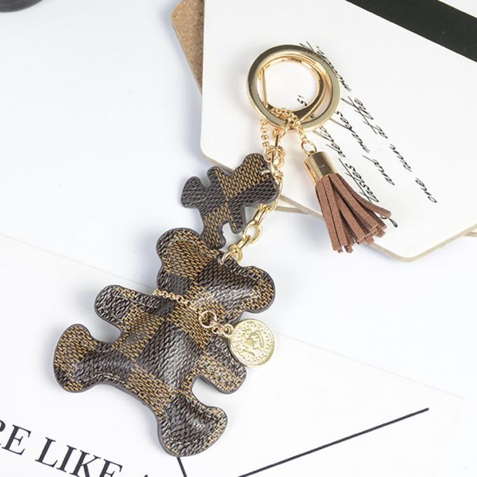 Le sac pendant en cuir en gros de chaîne principale de chien d'ours ornemente des accessoires Diamond Bear Keychain Keychains pour des femmes