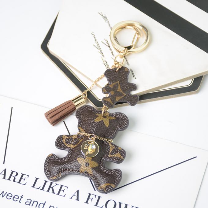 Le sac pendant en cuir en gros de chaîne principale de chien d'ours ornemente des accessoires Diamond Bear Keychain Keychains pour des femmes