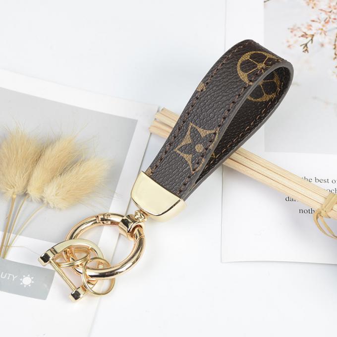 Le sac pendant en cuir en gros de chaîne principale de chien d'ours ornemente des accessoires Diamond Bear Keychain Keychains pour des femmes