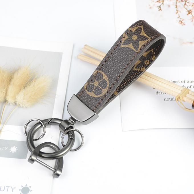 Le sac pendant en cuir en gros de chaîne principale de chien d'ours ornemente des accessoires Diamond Bear Keychain Keychains pour des femmes