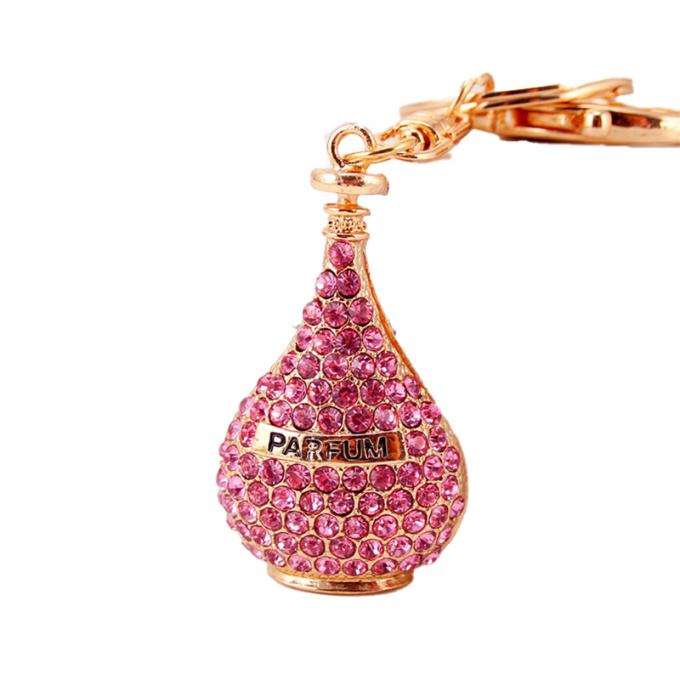 Les femmes pendantes en métal en gros de Diamond Crystal Perfume Car Key Ring mettent en sac les accessoires Keyhains en cristal pour des cadeaux